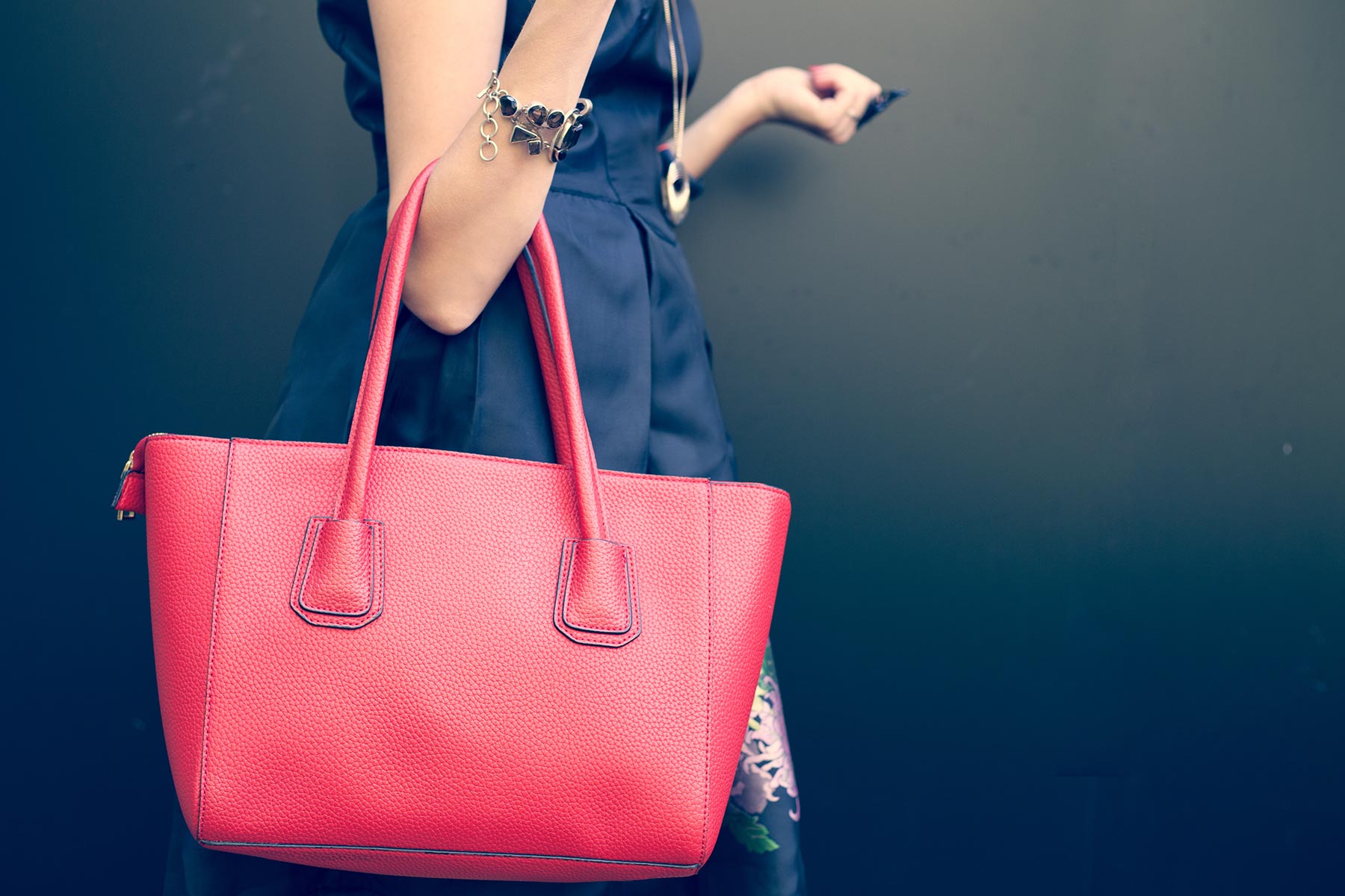 Woman carrying luxury handbag