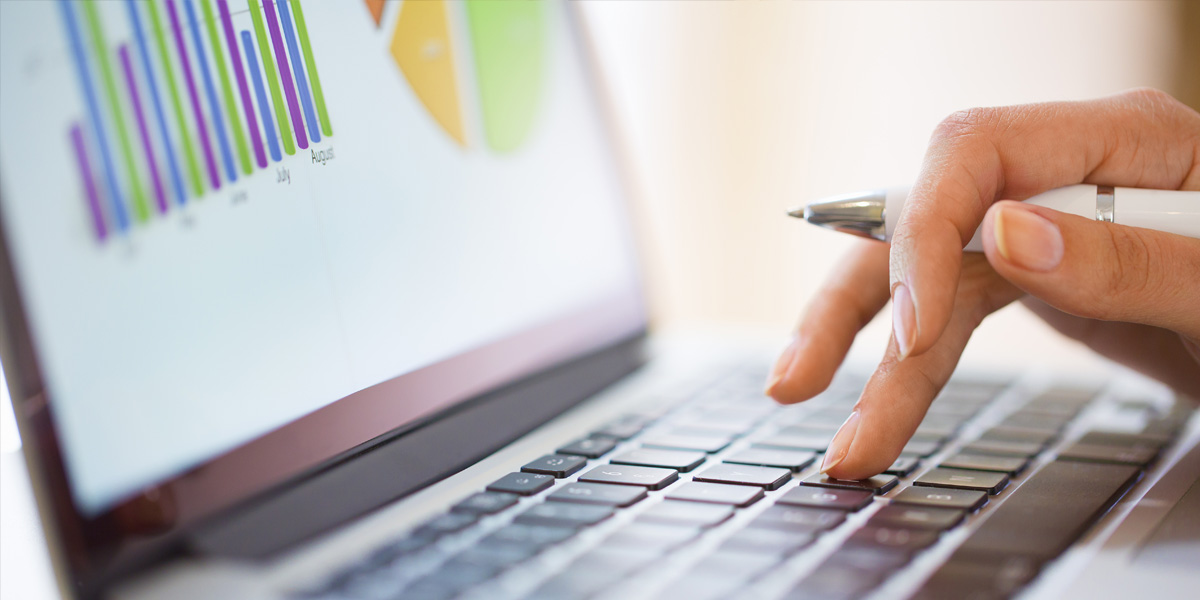 Woman typing on laptop