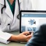 Health professional using laptop