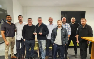 Arrow team being awarded 8x8 ANZ partner of the year 2024/2025